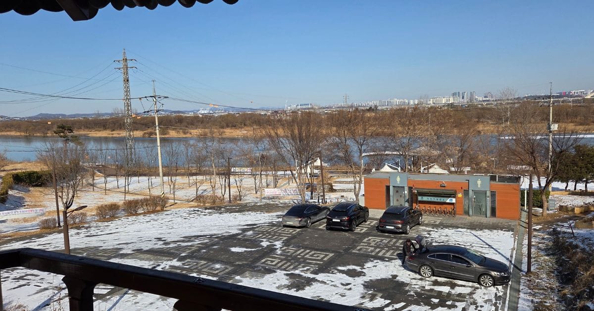 Bare trees and riverside scenery at Naeri Culture Park during winter