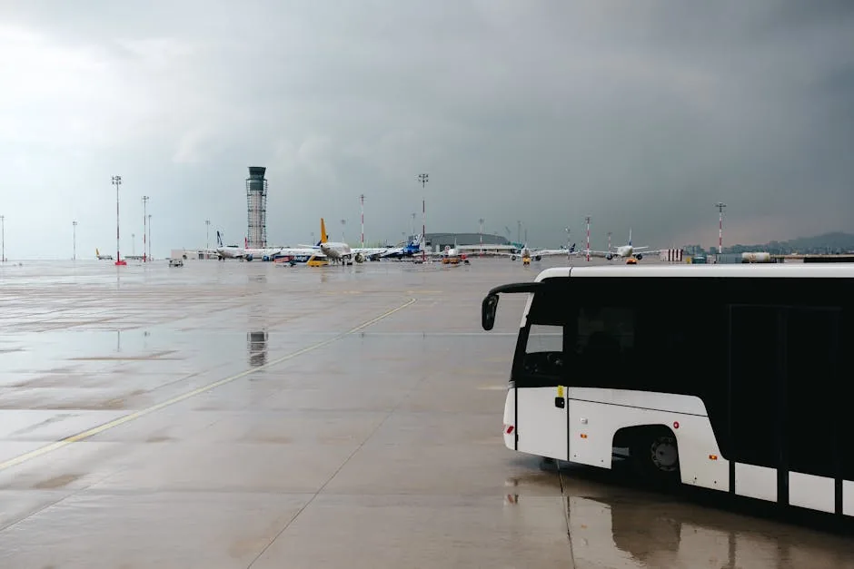 An express bus parked at an airport terminal, considering Korea express bus luggage policy.