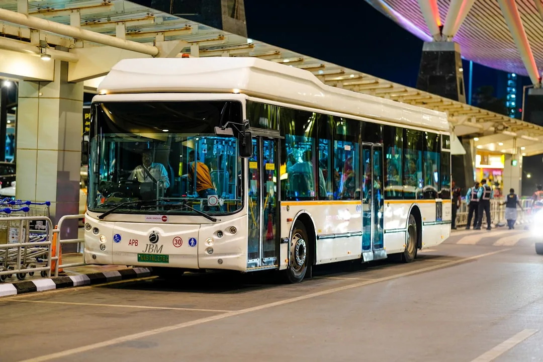 Passengers waiting at a designated bus stop, following an Incheon airport express bus guide.