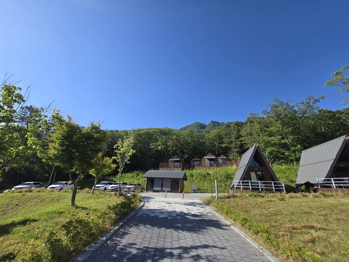Desk area and amenities in a Naejangsan Eco-Exploration Center accommodation.
